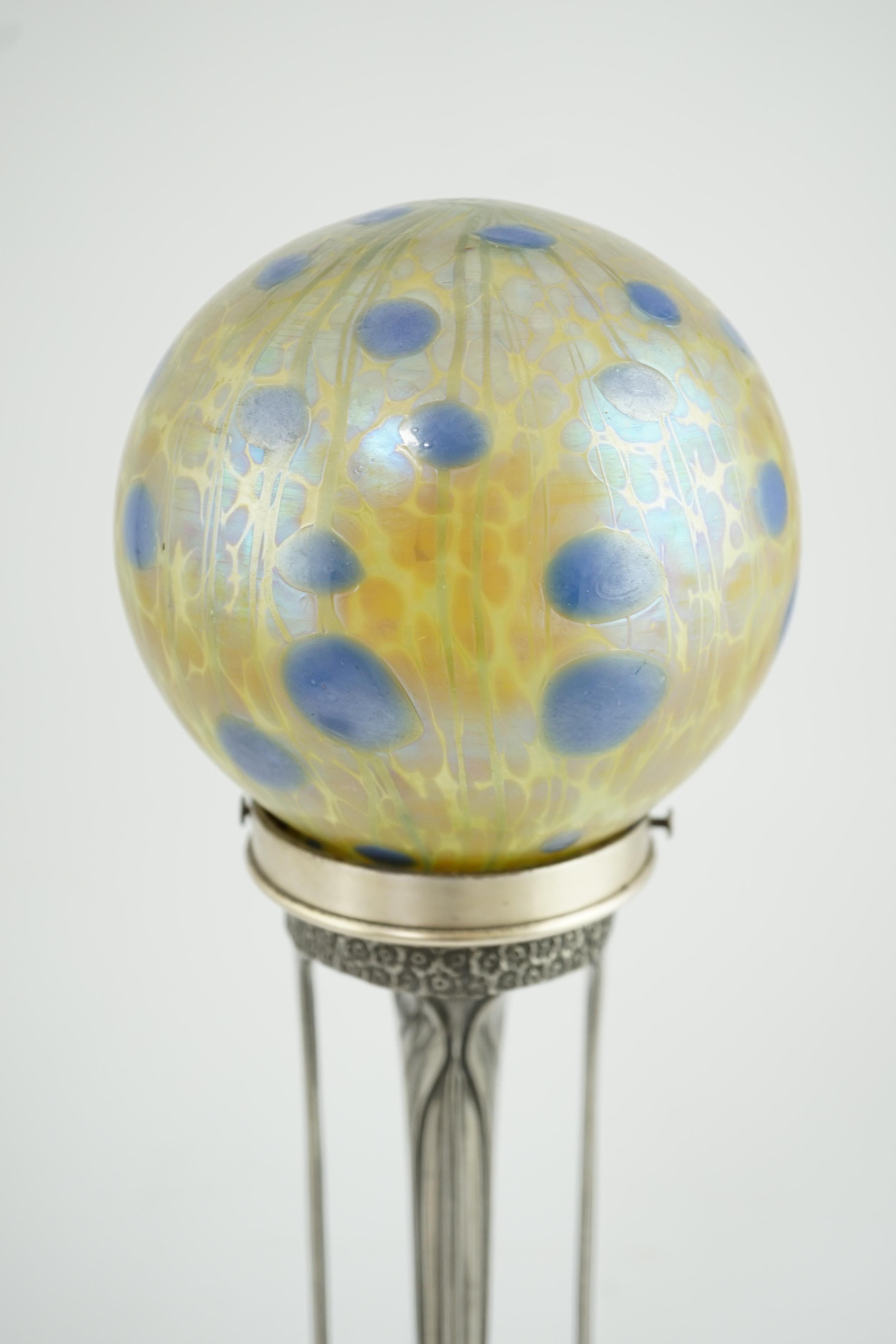 An Art Nouveau Orivit pewter table lamp with Loetz iridescent glass globular shade